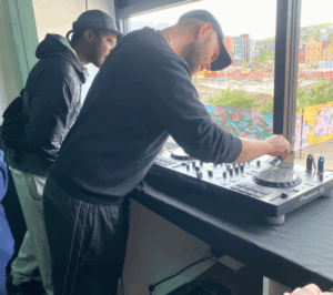 Young people at DJ decks