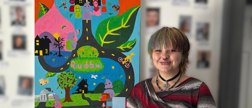 Libbi with her artwork