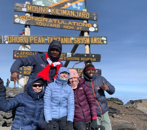 Lydia at the summit of Kilimanjaro