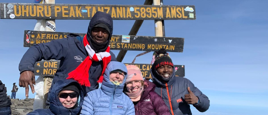 Lydia at the summit of Kilimanjaro