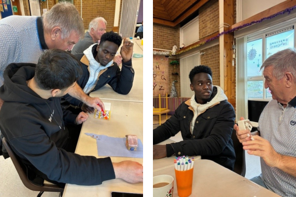 Jalal playing bingo at S12 Community Pantry